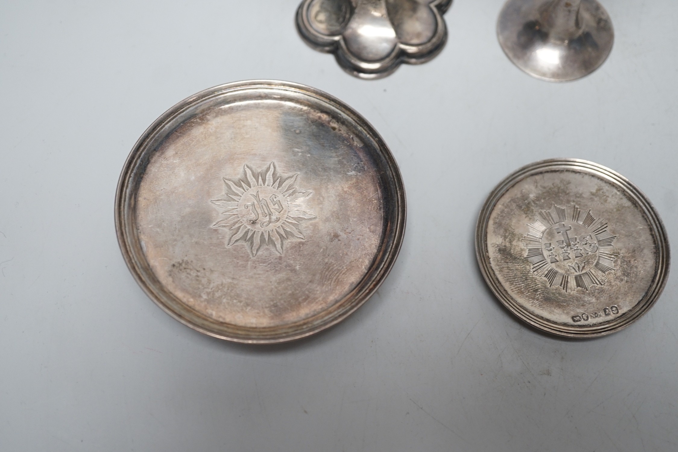 Three Victorian silver communion chalices, largest Thomas Thomason & Co, Birmingham, 1867, 10.1cm, Rawlings & Summers, London, 1854 and Josiah Williams & Co, London, 1889, together with three Victorian silver patens, lar